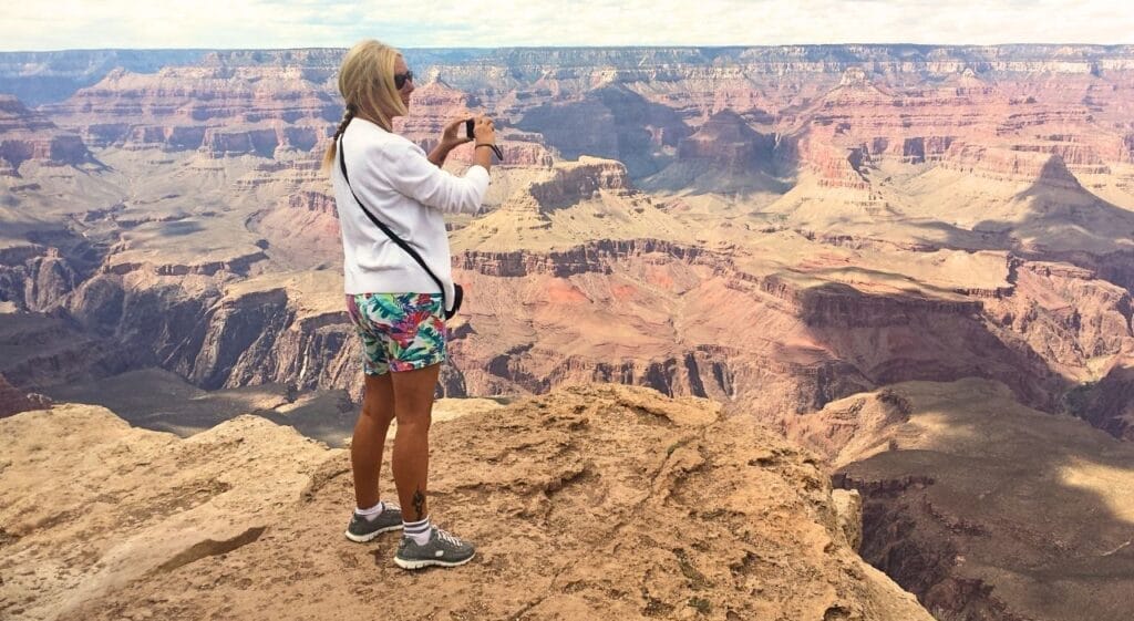 Janice Horton The Backpacking Housewife taking lots of photos from the South Rim of The Grand Canyon