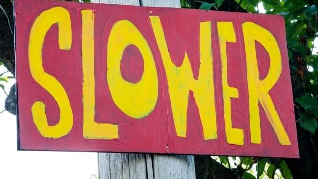 slow travel sign