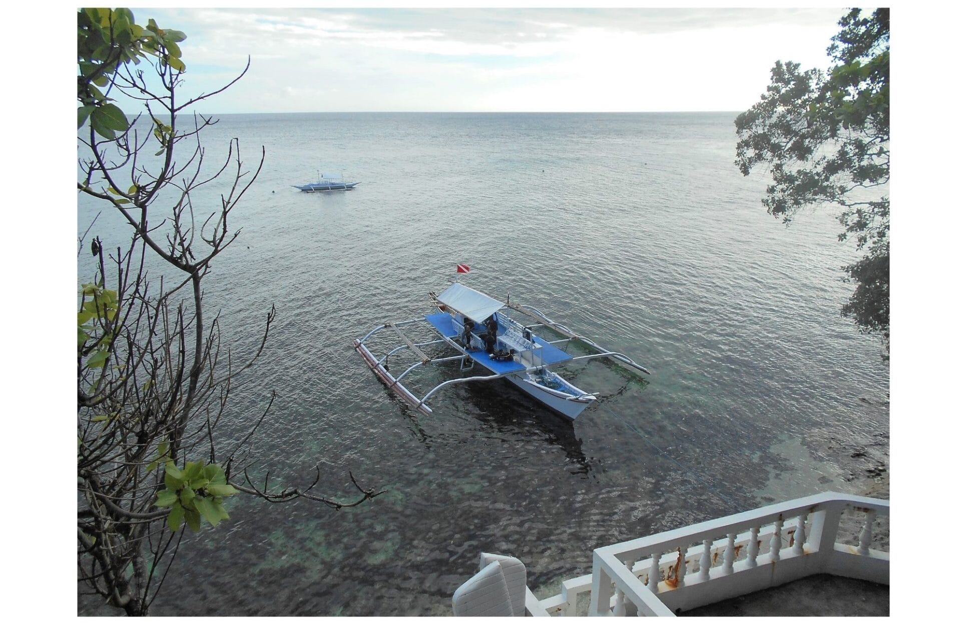 Early morning dive boat. Blue Star on Bohol is a 5 Star PADI Resort. The Backpacking Housewife. Island hopping Philippines.