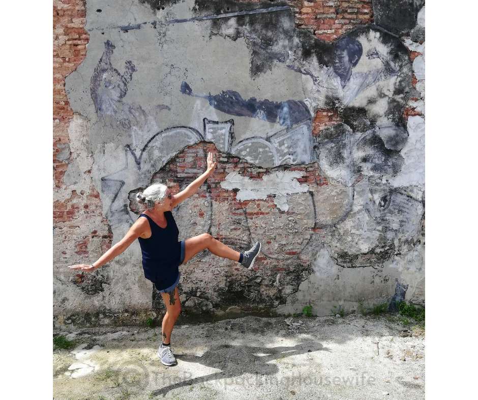 Backpacking Housewife The Real Bruce Lee Would Never Do This (by 101 Lost Kittens): This humorous mural depicting Bruce Lee dancing with a chicken