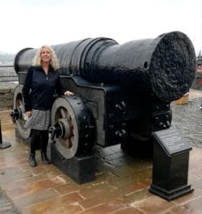 Janice Horton with Mons Meg Gun at Edinburgh castle