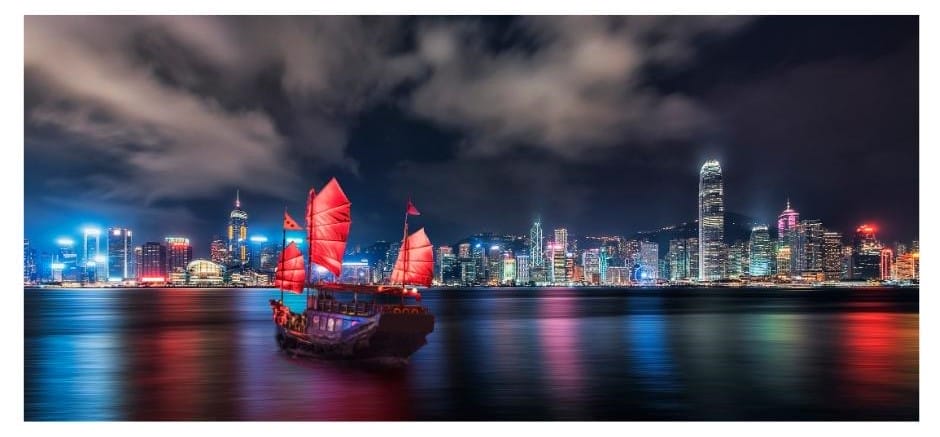 We boarded an old junk boat - an old traditional sailing boat with billowing red sails - on Victoria Harbour Hong Kong