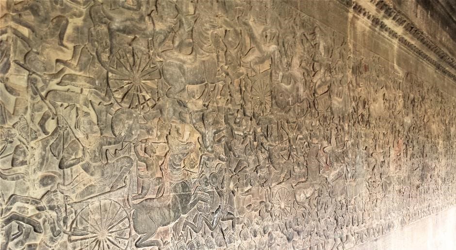 The temple’s stone hallways at Angkor Wat are decorated with the longest continuous bas-relief sculptures and carvings in the world from Hindu mythology.