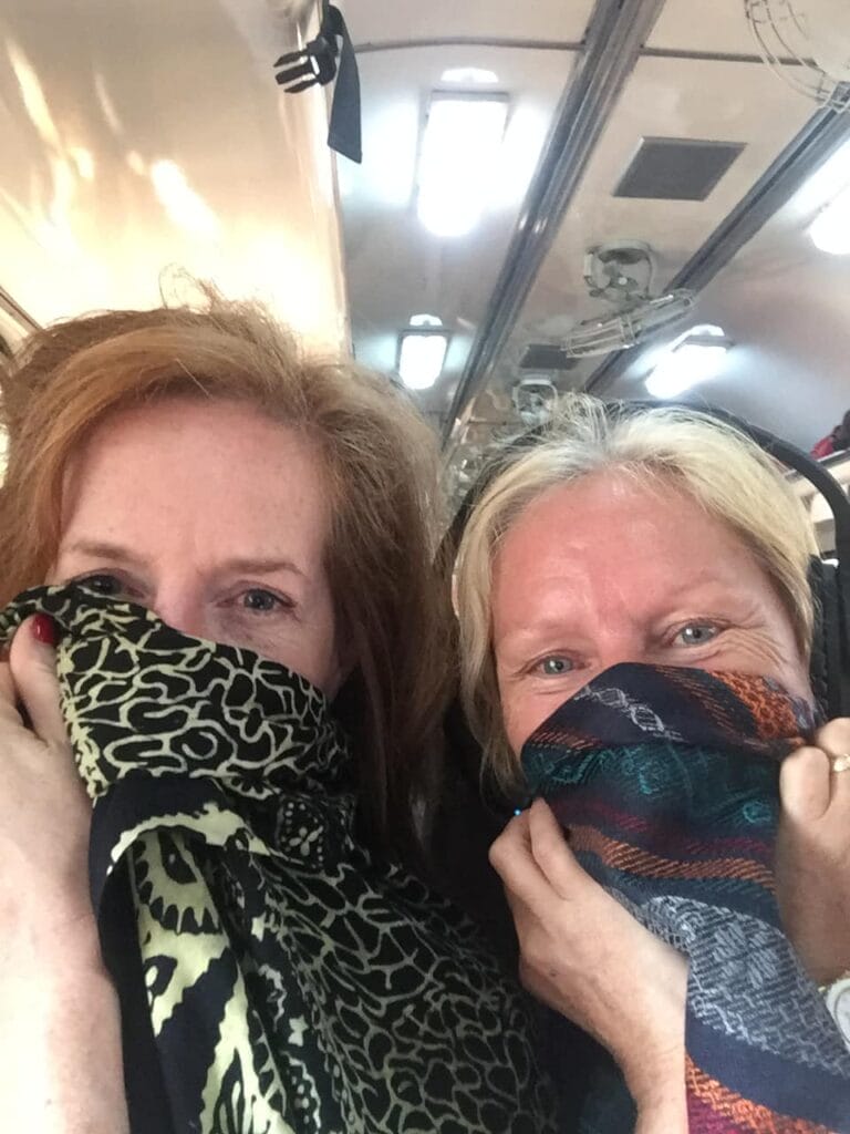 We wrapped our scarfs over our noses against the awful wafts from the toilet on the train
