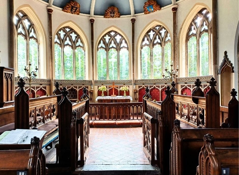 Moreton Church Dorset Windows. Each etched window has an individual theme